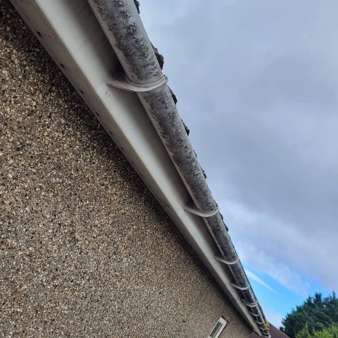 Guttering along fascia board