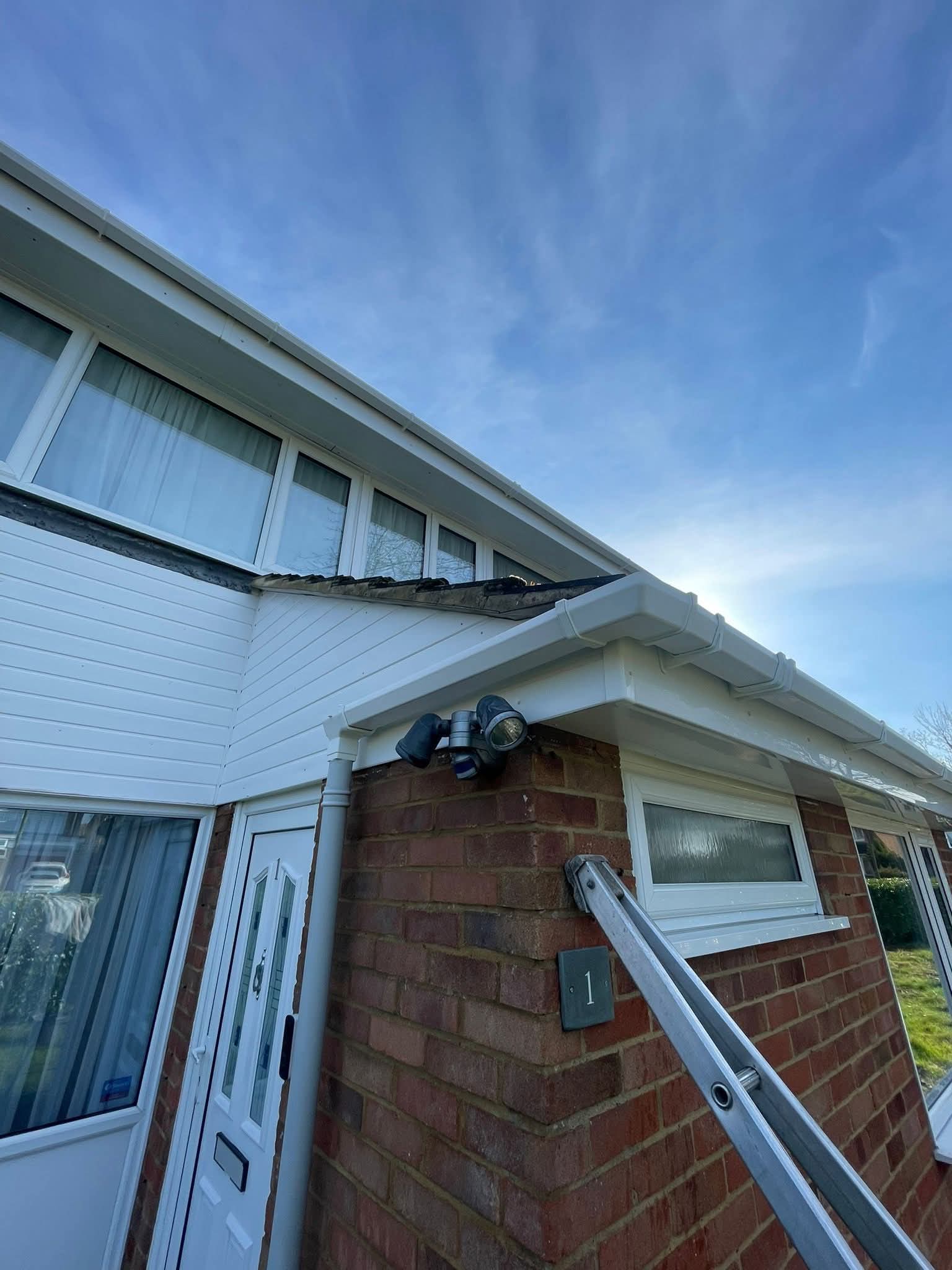 Parapet or eaves gutter in context