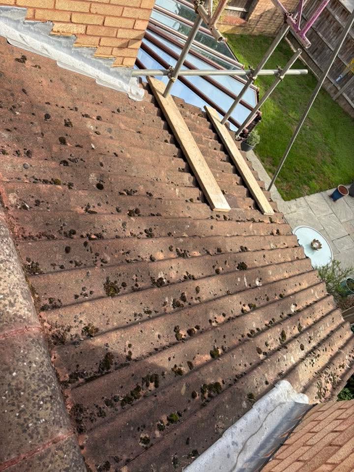 Steep tile roof accessed safely for cleaning